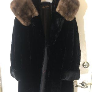 genuine low cut mink with fur hood. Good condition